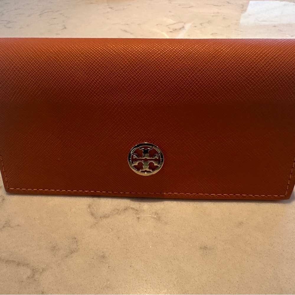Tory Burch sunglasses with burnt orange case